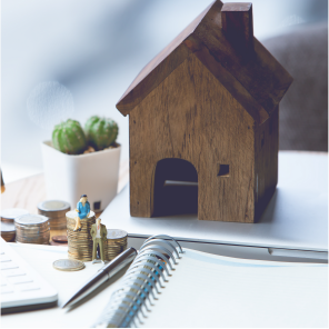 ノートの上に家がたっている